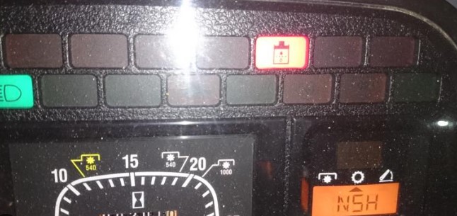 How can I fix the Case 450 Skid Steer Warning Lights and Symbols