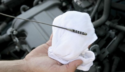 Where is the Oil Dipstick Located on a 2009 BMW 328i